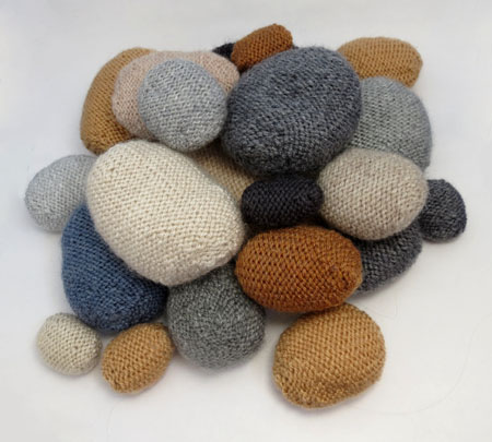photo of knitted pebbles