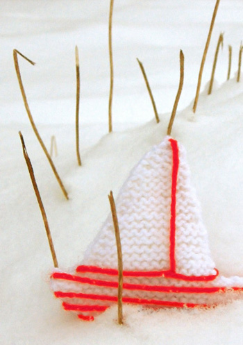 photo of two tone ship decoration in the snow