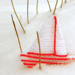 photo of two tone ship decoration in snow