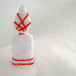 photo of candle decoration in snow