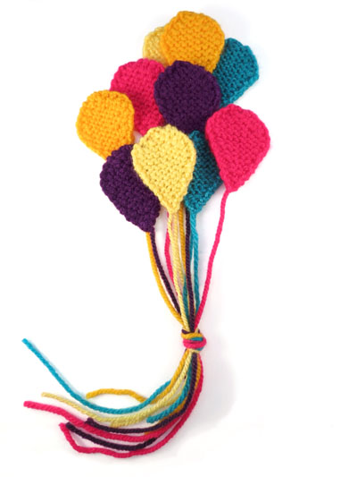 photo of little knitted balloons
