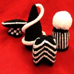a set of knitting patterns for egg cosies